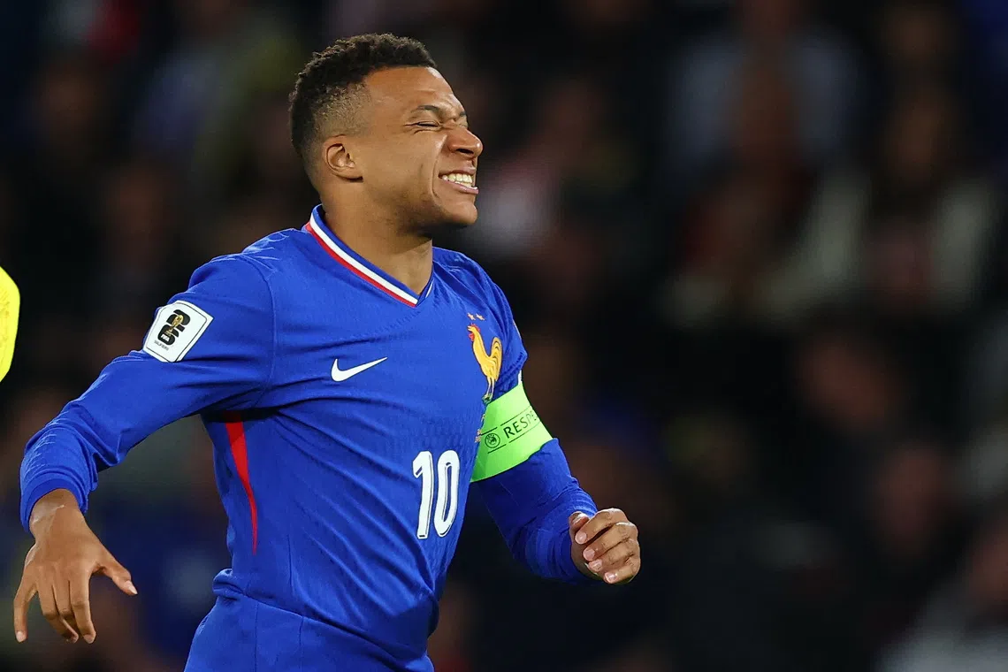 Soccer Football - World Cup - UEFA Qualifiers - Group D - France v Ukraine - Parc des Princes, Paris, France - November 13, 2025 France's Kylian Mbappe reacts REUTERS/Gonzalo Fuentes