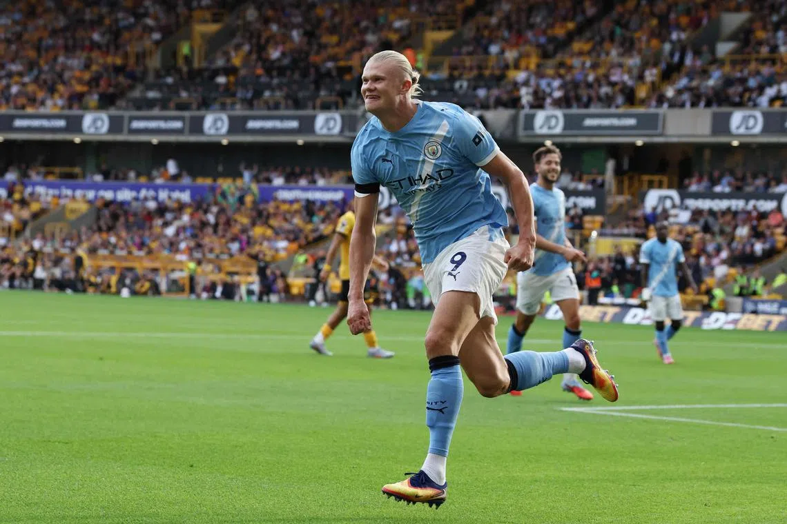 Manchester City's Norwegian striker Erling Haaland celebrating after scoring their third goal in the 4-0 English Premier League win over Wolverhampton Wanderers at the Molineux in Wolverhampton on Aug 16, 2025. 