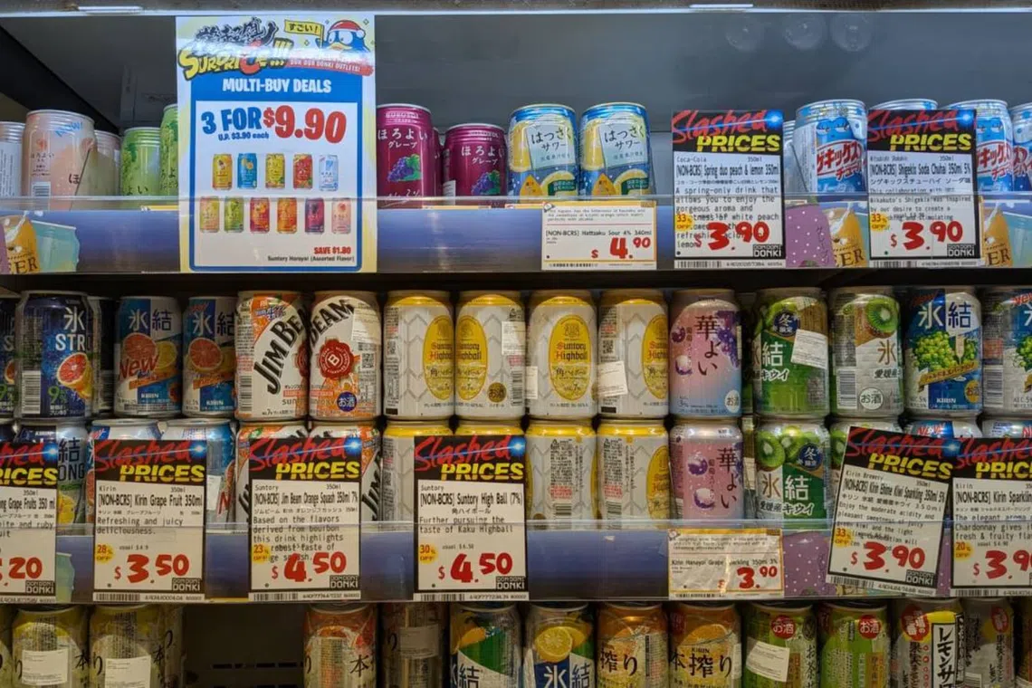straitstimes.com - Chin Hui Shan - Half-priced beers and discounted tea: Retailers slash prices on drinks without Return Right logo