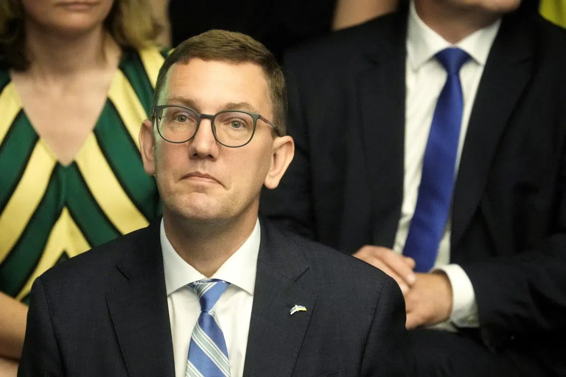 Estonia's new Prime Minister Kristen Michal attends an extraordinary session at the country's Parliament Riigikogu to swear in his government in Tallinn, Estonia, July 23, 2024. REUTERS/Ints Kalnins