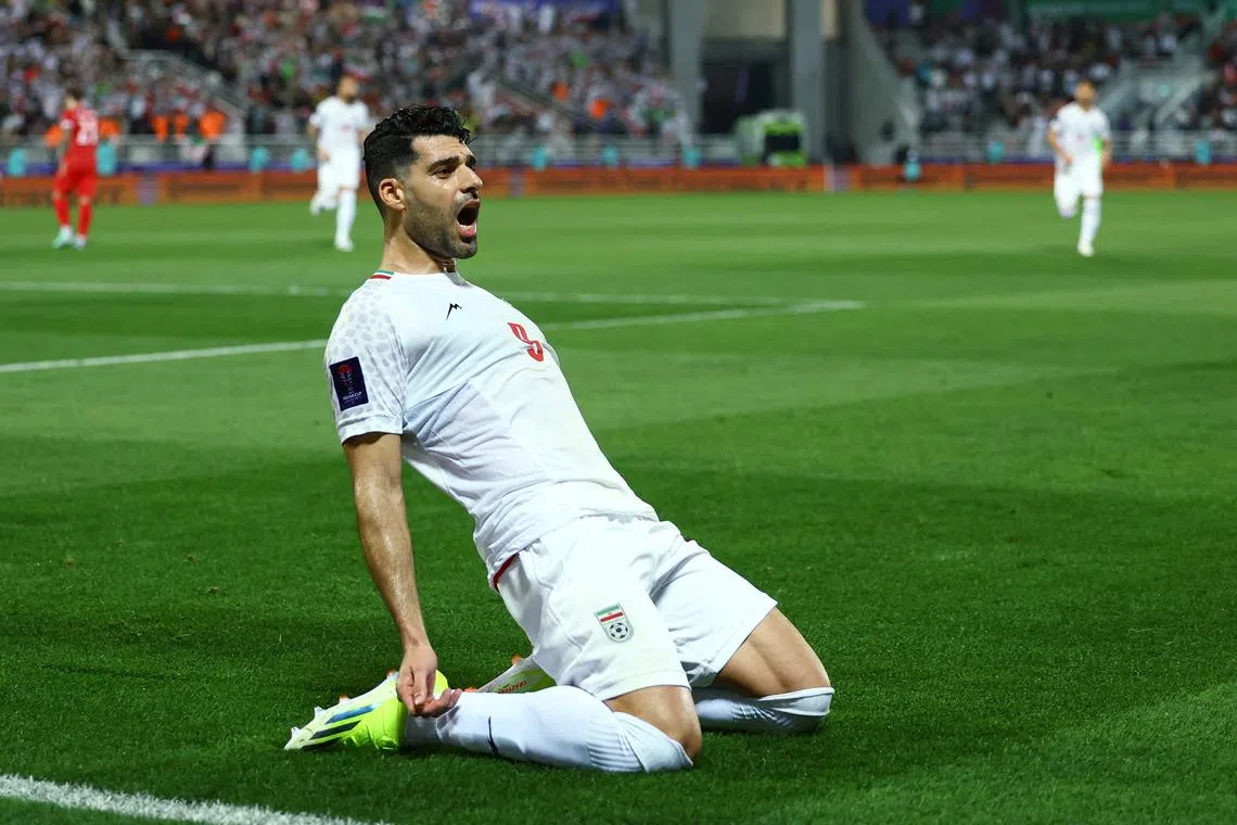 FILE PHOTO: Soccer Football - AFC Asian Cup - Round of 16 - Iran v Syria - Abdullah bin Khalifa Stadium, Doha, Qatar - January 31, 2024 Iran's Mehdi Taremi celebrates scoring their first goal REUTERS/Molly Darlington/File Photo