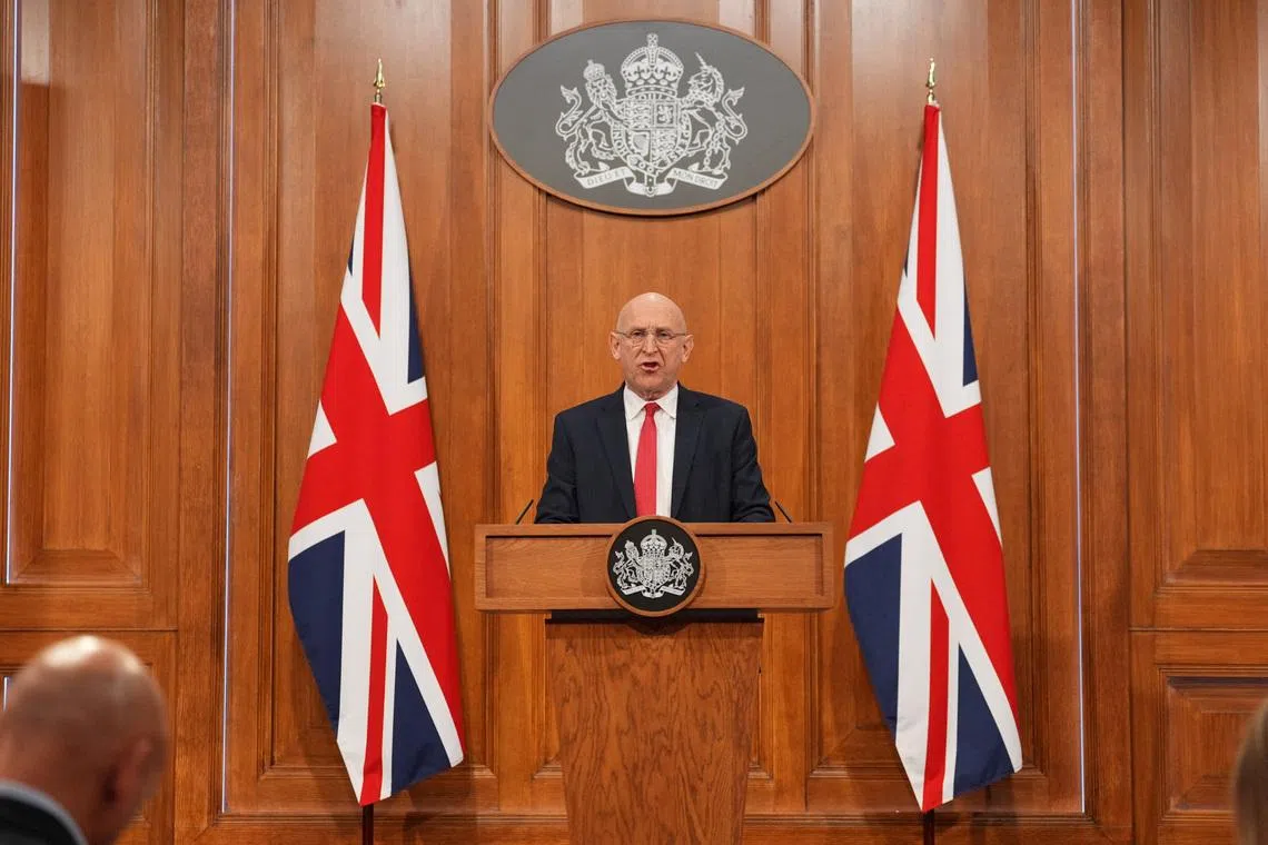 Britain's Defence Secretary John Healey delivers a statement on recent UK operational activity at 9 Downing Street in Westminster, central London, Britain, April 9, 2026.