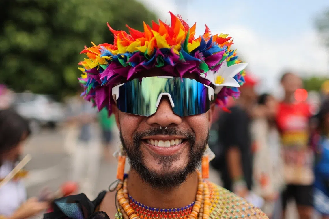 A protester from Guam joined thousands of people marching in Belem, Brazil, on Nov 15, to demand climate action from negotiators holding tough talks at the United Nations’ COP30 climate conference.