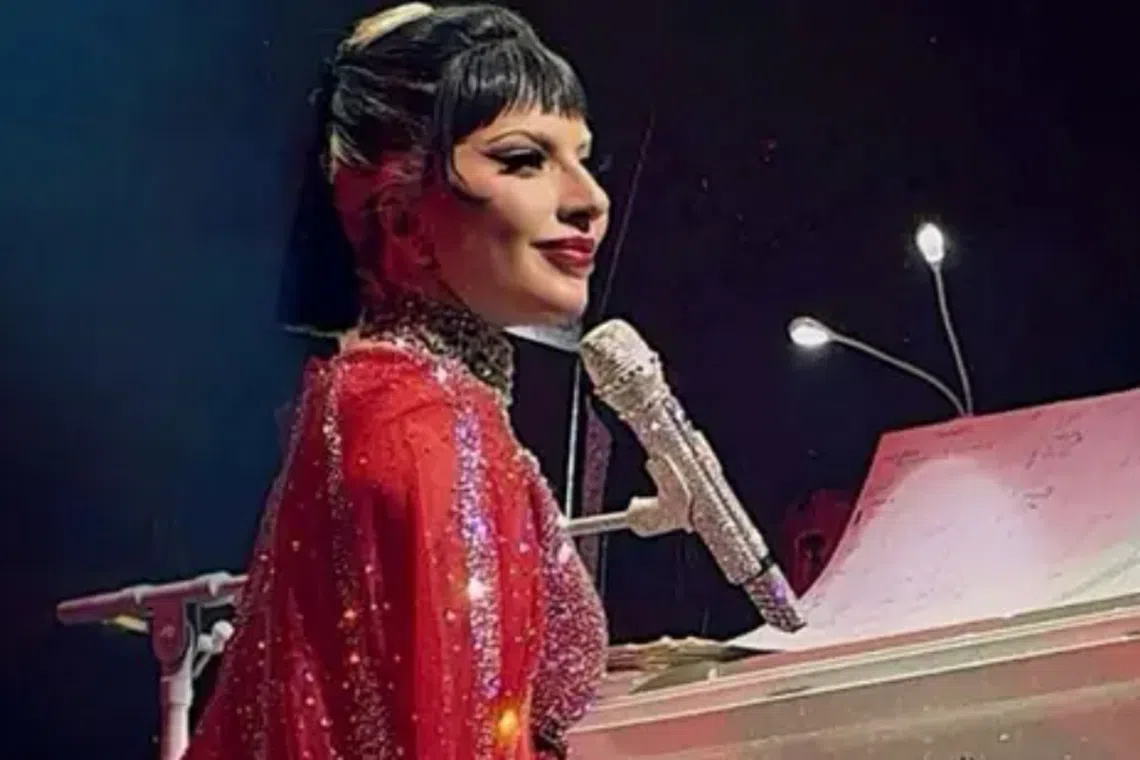 The red dress dripped with Swarovski crystals.