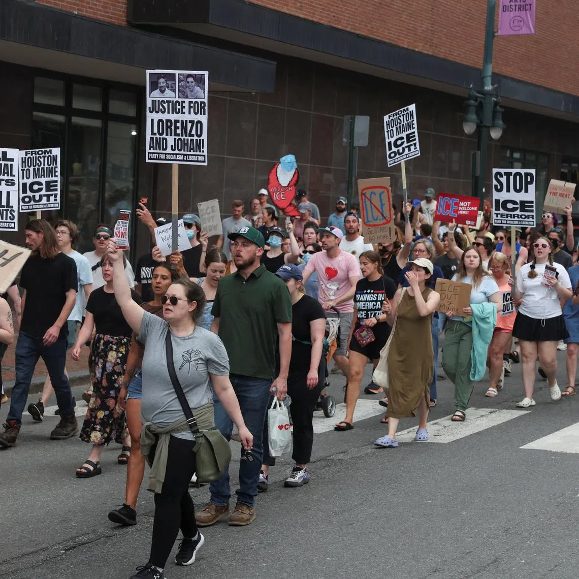 Demonstrators march a day after a U.S. Immigration and Customs Enforcement (ICE) agent killed a driver in the coastal Maine town of Biddeford, in Portland, Maine, U.S., July 14, 2026. REUTERS/Shannon Stapleton