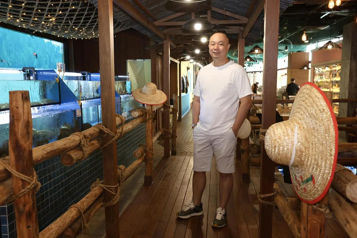 hkkeith19 - Mr Keith Kang, founder of Yang Ming Seafood, at his third and newest outlet at VivoCity. 

ST PHOTO: HEDY KHOO