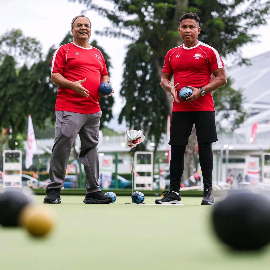 Singapore para-lawn bowlers Mawjit Singh (left) and Khirmern Mohamad at Kallang Lawn Bowls on July 8.