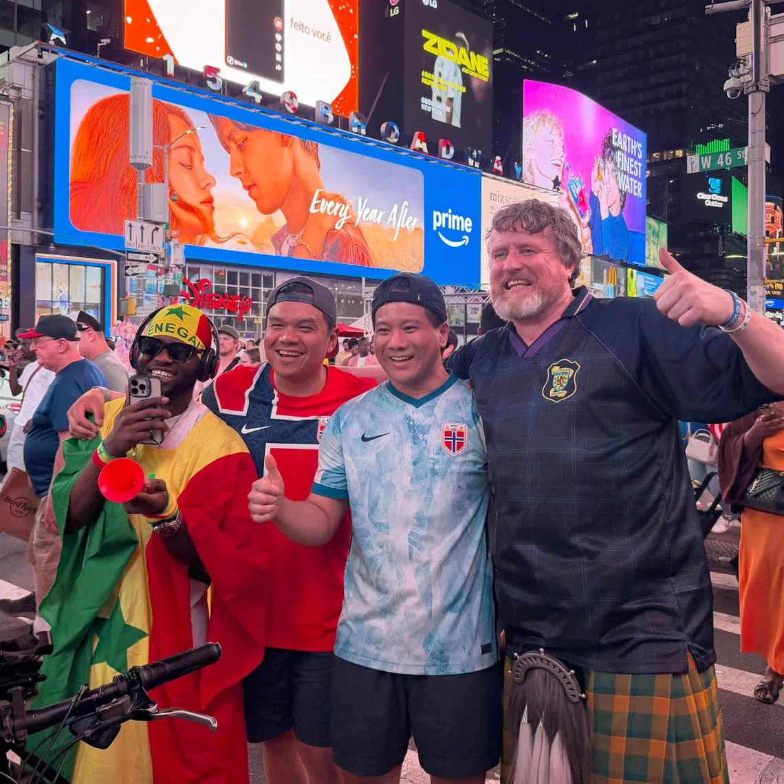 Football fans from around the world have invaded Times Square during the World Cup, making for a beautiful sight.