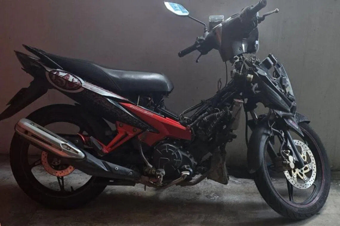 The motorcycle was parked at a building in Woodlands Close.