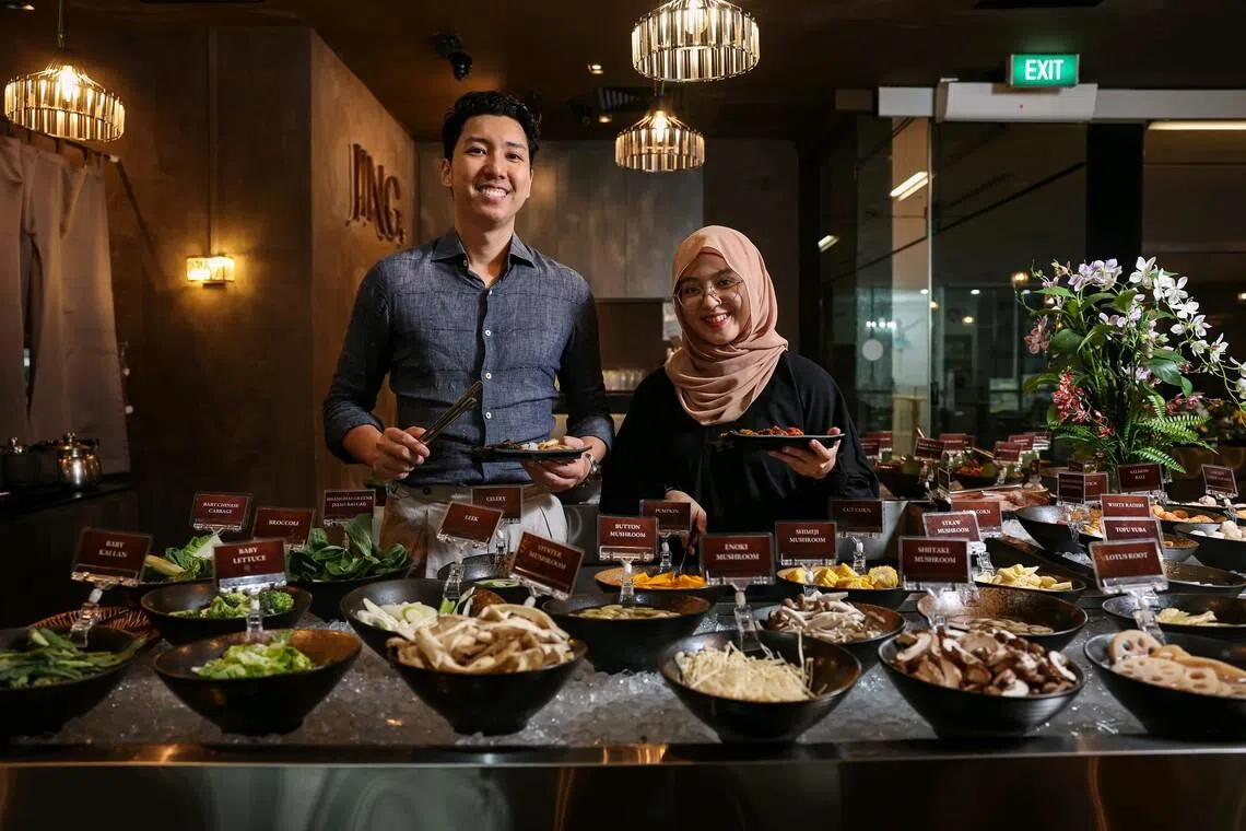 JING Hotpot and Grill’s director and co-founder Jack Kwong (left), seen with its marketing manager, says some landlords are making an effort to set aside space for Singapore brands to grow.