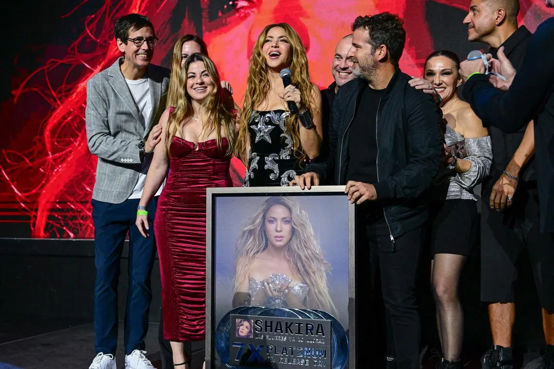 Shakira recieves the platinum certification for her song Las Mujeres Ya No Lloran during the release party for her album at Seminole Hard Rock Live in Hollywood, Florida, on March 21.