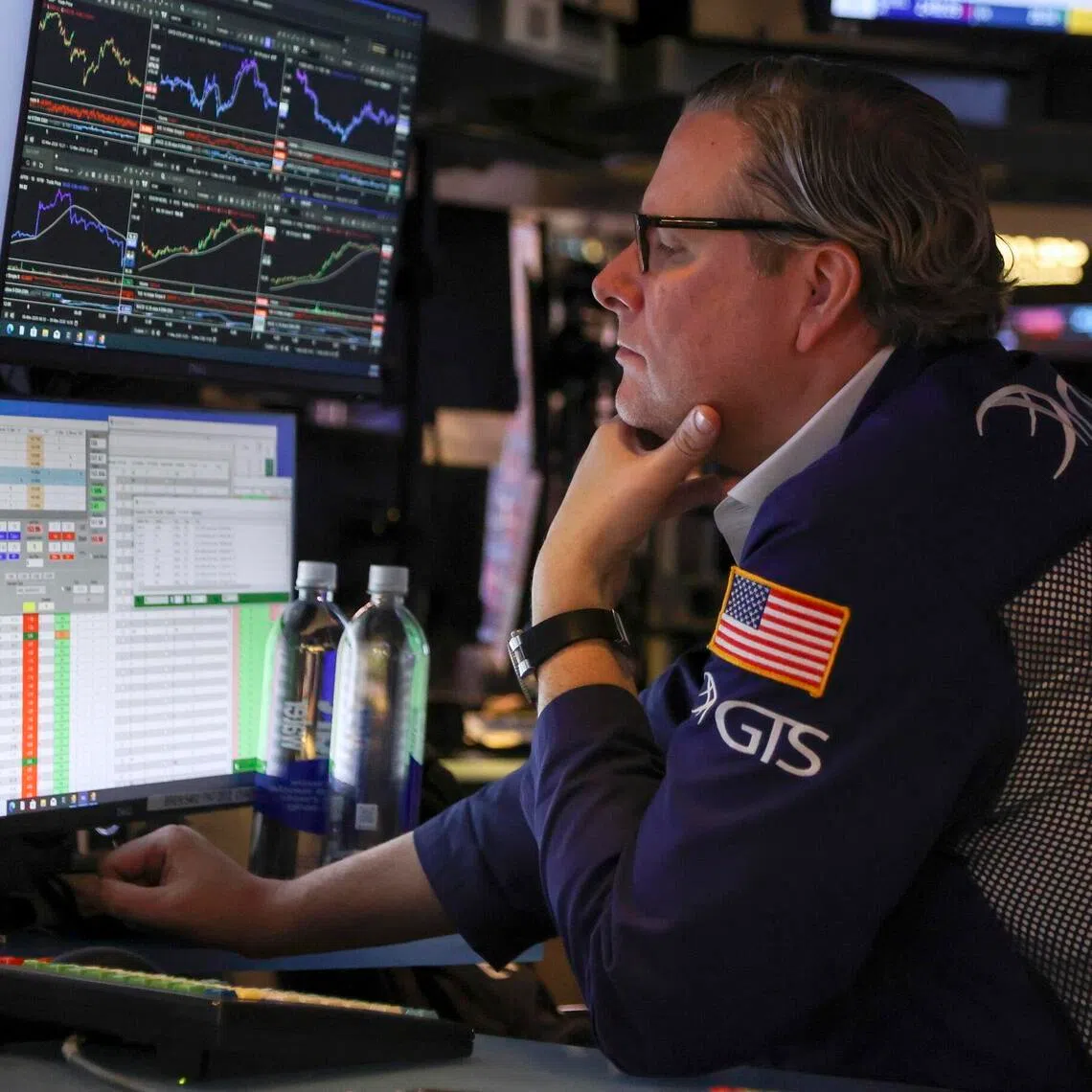 epa12815119 A trader works on the New York Stock Exchange floor before the closing bell in New York, New York, USA, 12 March 2026.  EPA/SARAH YENESEL