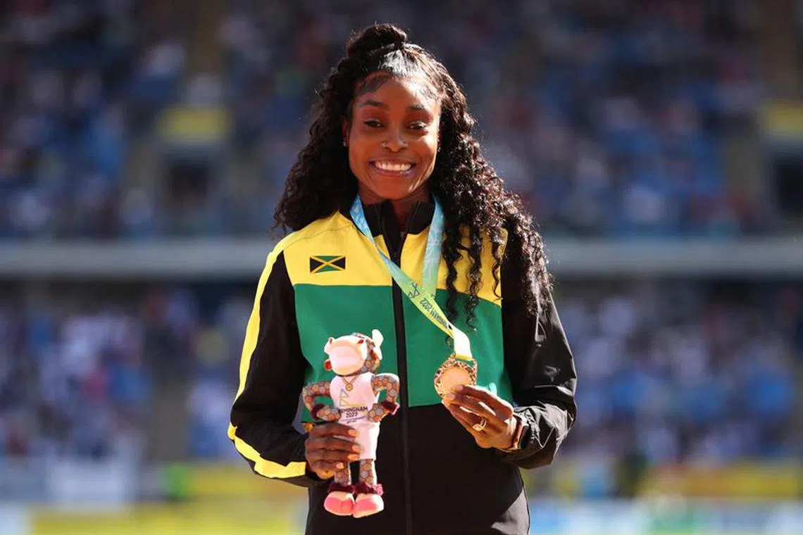 Commonwealth Games - Athletics - Women's 200m - Medal Ceremony - Alexander Stadium, Birmingham, Britain - August 7, 2022 Gold medallist Jamaica's Elaine Thompson-Herah celebrates on the podium REUTERS/Phil Noble/ File photo