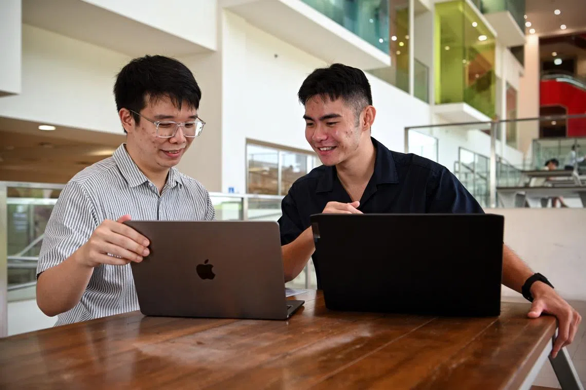 First-year SIT students Toh Ke Han (left) and Yeon Jun Fu. SIT received nearly 13,000 admission applications in the 2022 academic year.