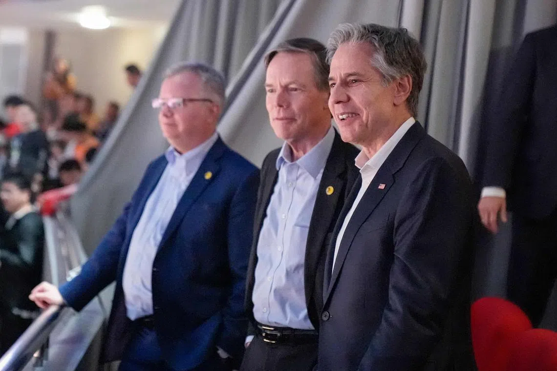 US Secretary of State Antony Blinken (right) talks with US Ambassador to China Nicholas Burns (centre) with US Consulate General in Shanghai Scott Walker.