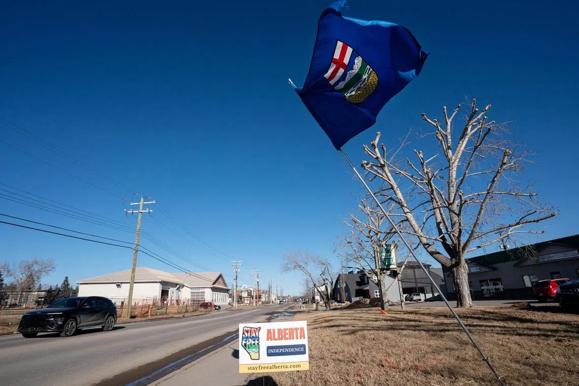 FILE PHOTO: An Alberta flag flies at an Alberta Independence petition signing location in High River, Alberta, Canada February 5, 2026.  REUTERS/Todd Korol/File Photo