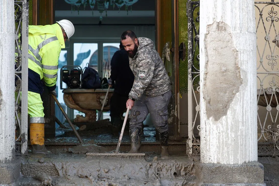 Rescuers clean up following a landslide on the Italian holiday island of Ischia, Italy, Nov 27, 2022.