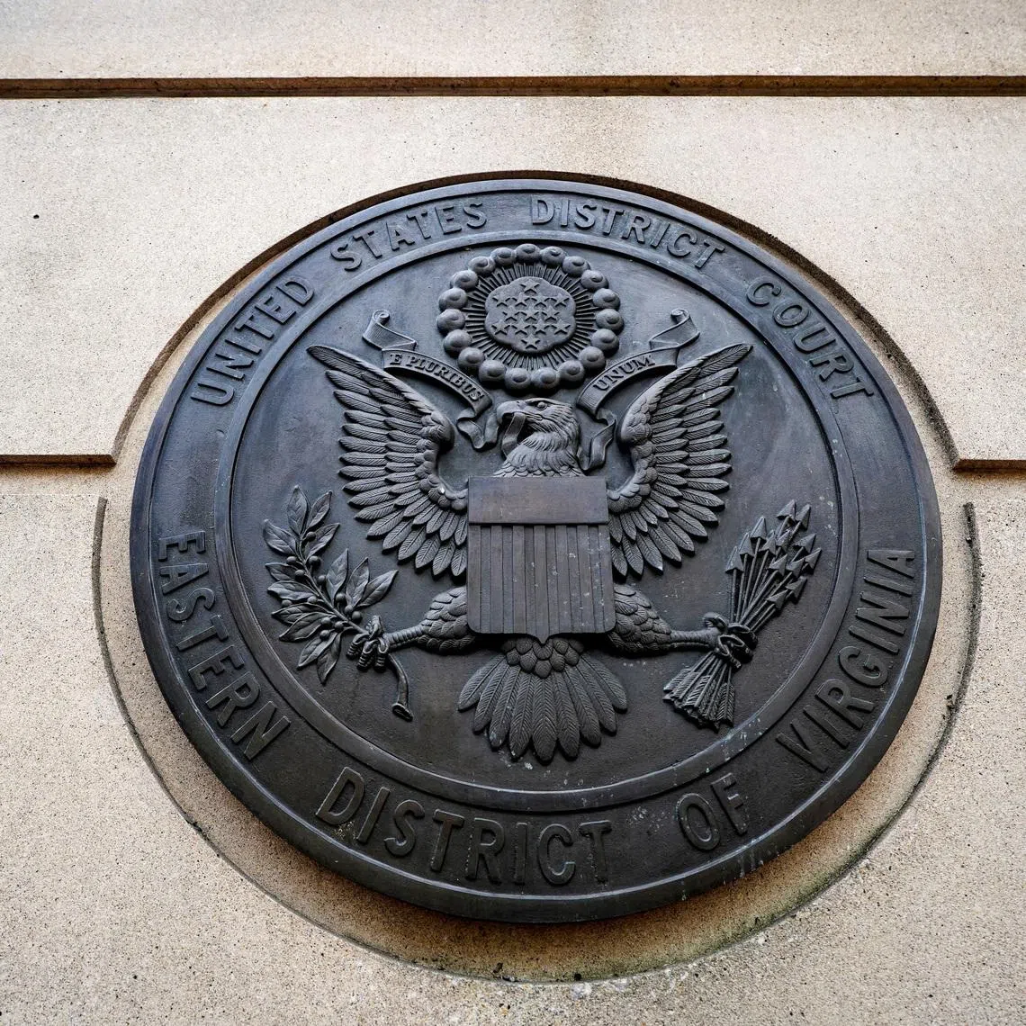 The seal of the U.S. District Court for the Eastern District of Virginia, at the Albert V. Bryan courthouse, stands in Alexandria, Virginia, U.S., September 25, 2025. REUTERS/Al Drago