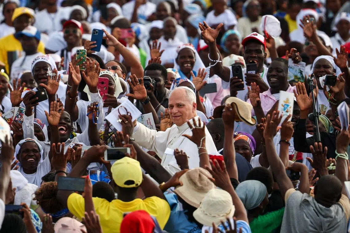 Pope Leo XIV amid faithful, on the day of a Holy Rosary Prayer at the Mama Muxima shrine, during his apostolic journey to Africa, in Muxima, Angola, April 19.