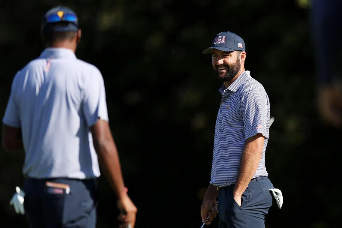 Scottie Scheffler of the United States Team talking to teammate Sahith Theegala during a practice round before the 2024 Presidents Cup at The Royal Montreal Golf Club on Sept 24 in Montreal, Quebec, Canada.