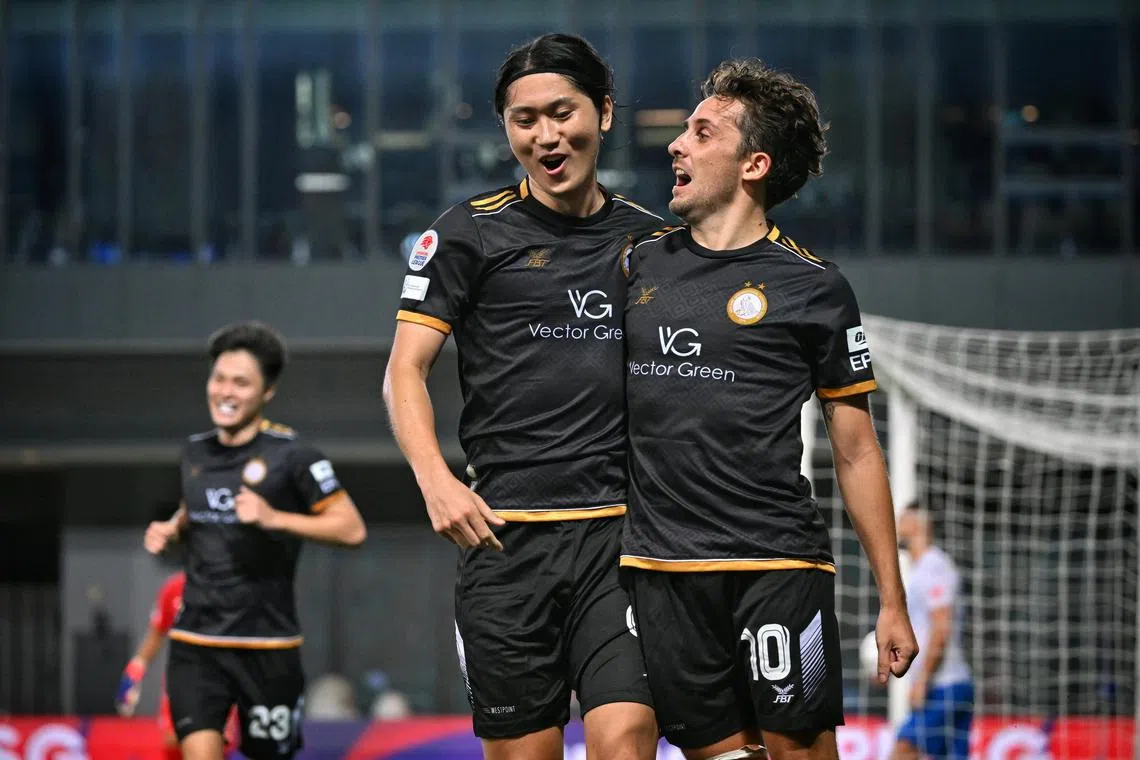 Geylang International forward Tomoyuki Doi celebrating his goal with Vincent Bezecourt in the 3-2 win over the Lion City Sailors at Our Tampines Hub on May 4.