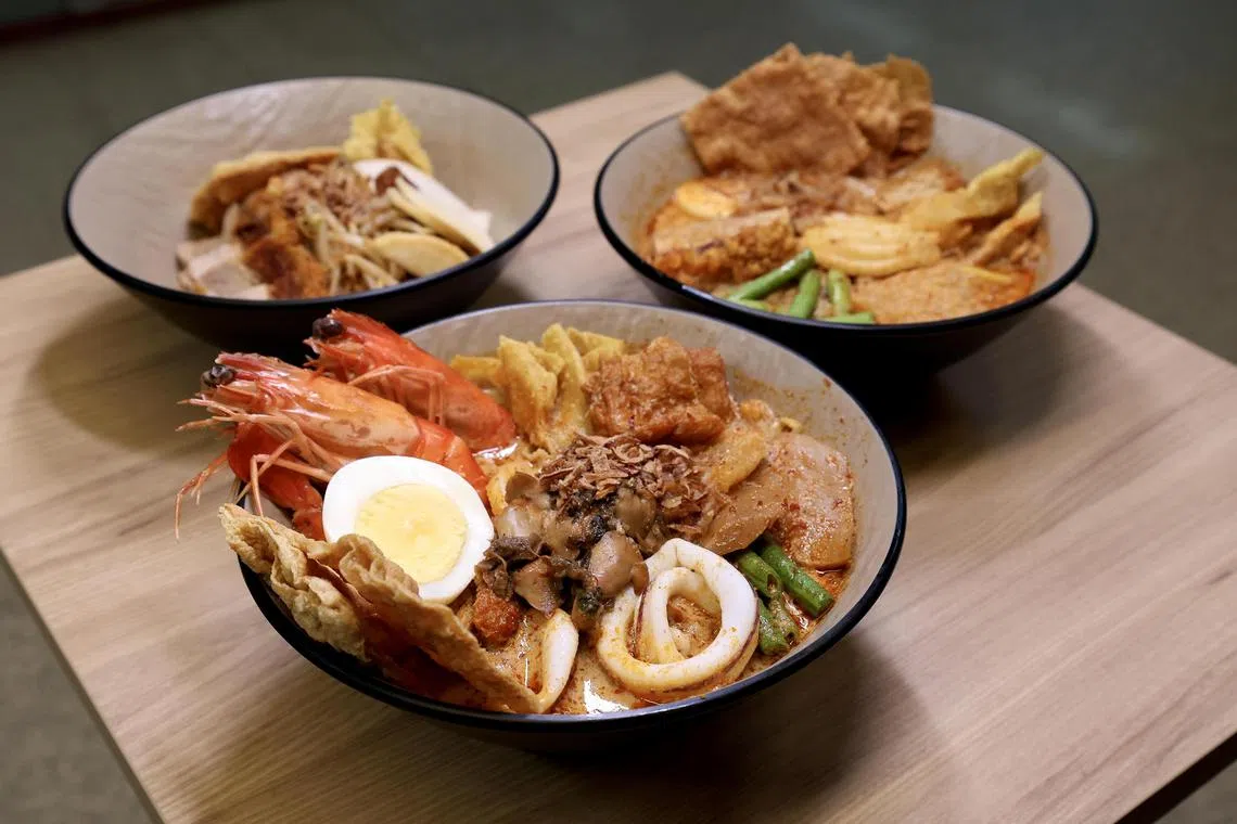 Clockwise from top left: Dry Curry Mee, Signature Curry Mee and Jumbo Curry Mee at Kangji Curry Mee.