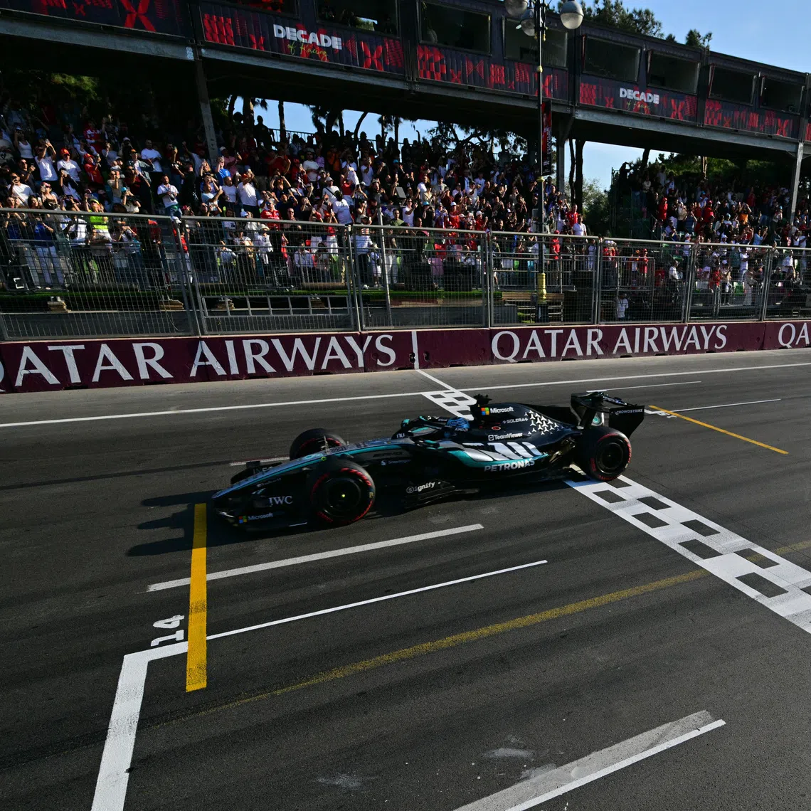 Mercedes’ George Russell crosses the line to win the Azerbaijan Grand Prix.