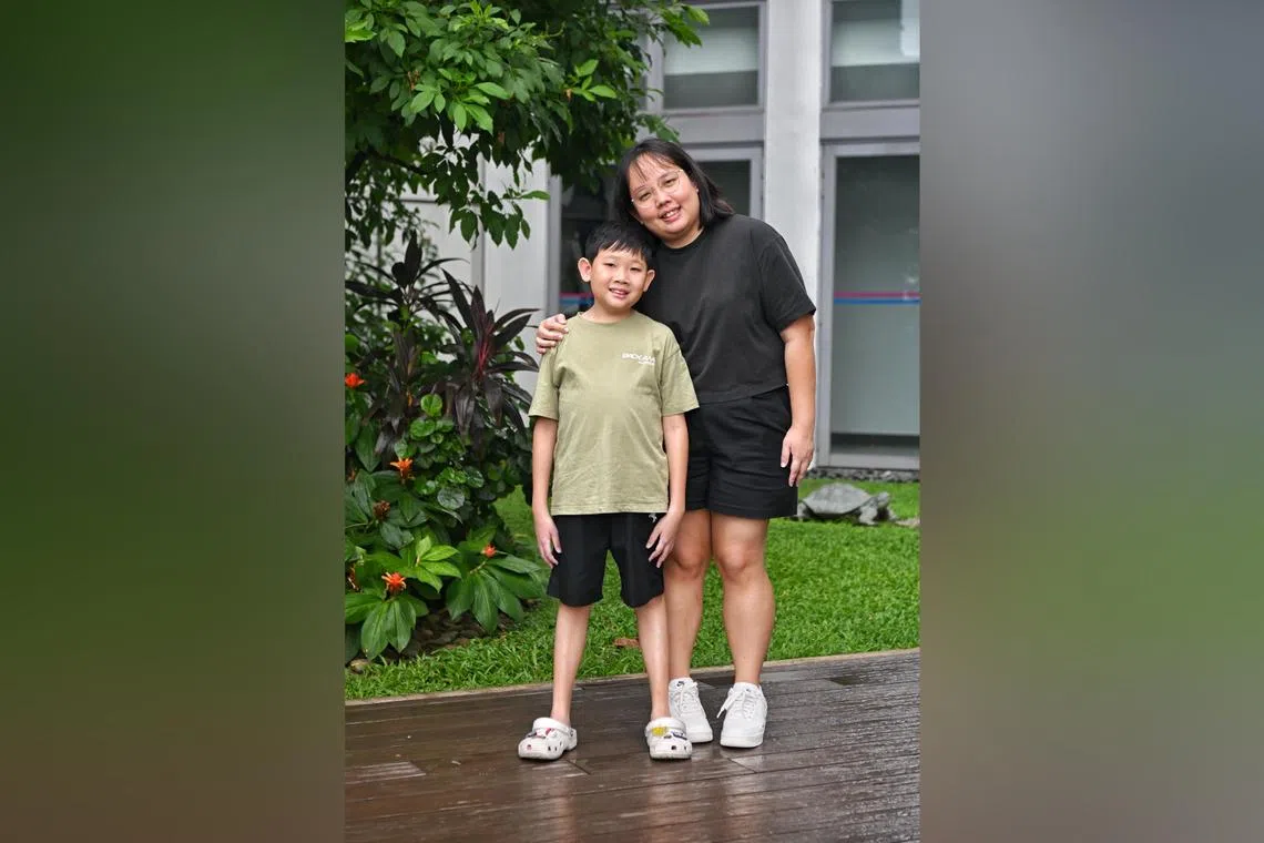 Kayden Soh, 13, who has Glycogen Storage Disorder Type 1A (GSD1A), with his mother, Ms Yong Xiao Ping. GSD1A caused Kayden's body to prioritise essential functions over growth, making him much smaller than his classmates.