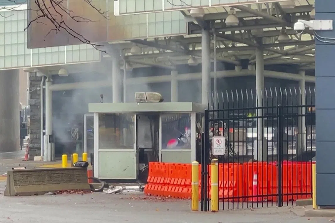 Smoke lingers after an incident at the Rainbow Bridge US border crossing with Canada, in Niagara Falls.