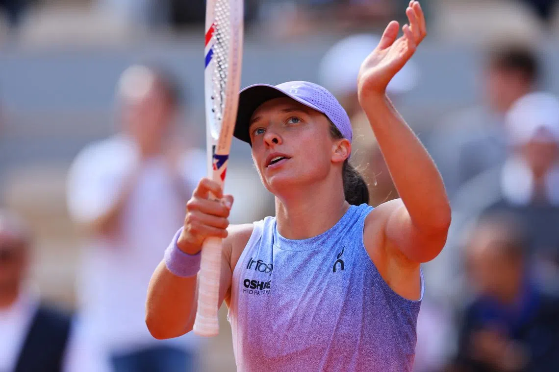 Tennis - French Open - Roland Garros, Paris, France - May 28, 2025 Poland's Iga Swiatek celebrates winning her second round match against Britain's Emma Raducanu REUTERS/Denis Balibouse
