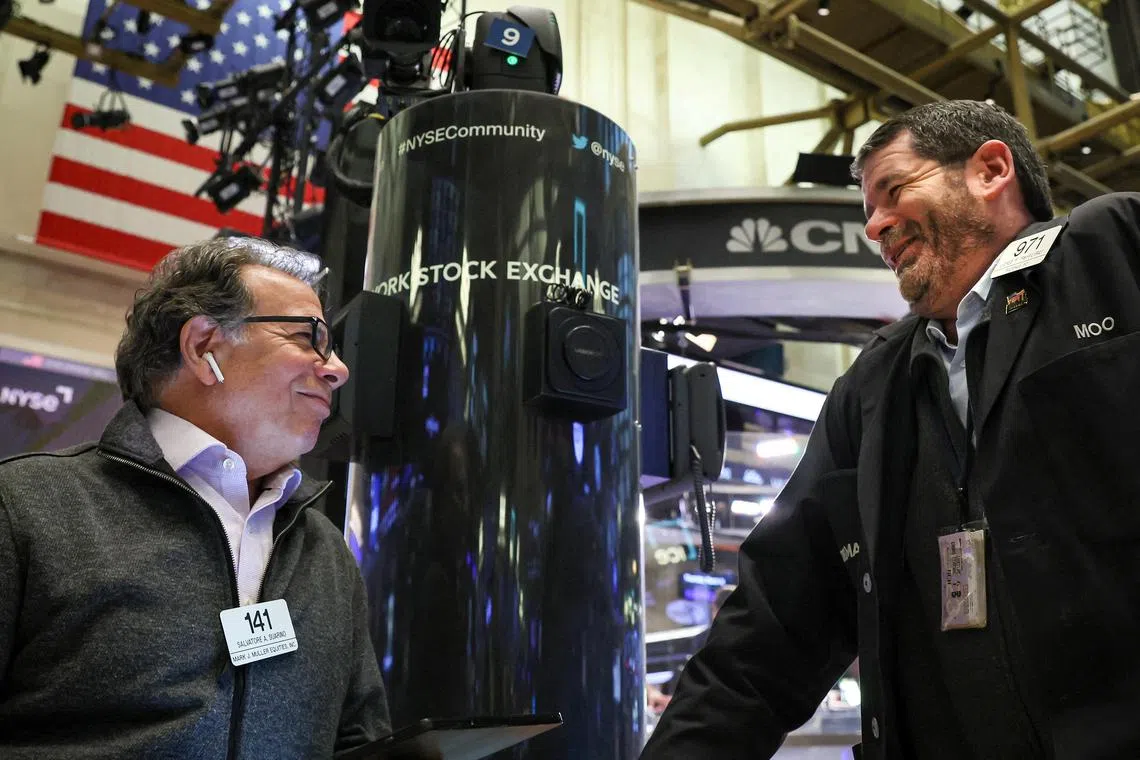 Traders work on the floor of the New York Stock Exchange, on March 16, 2023.
