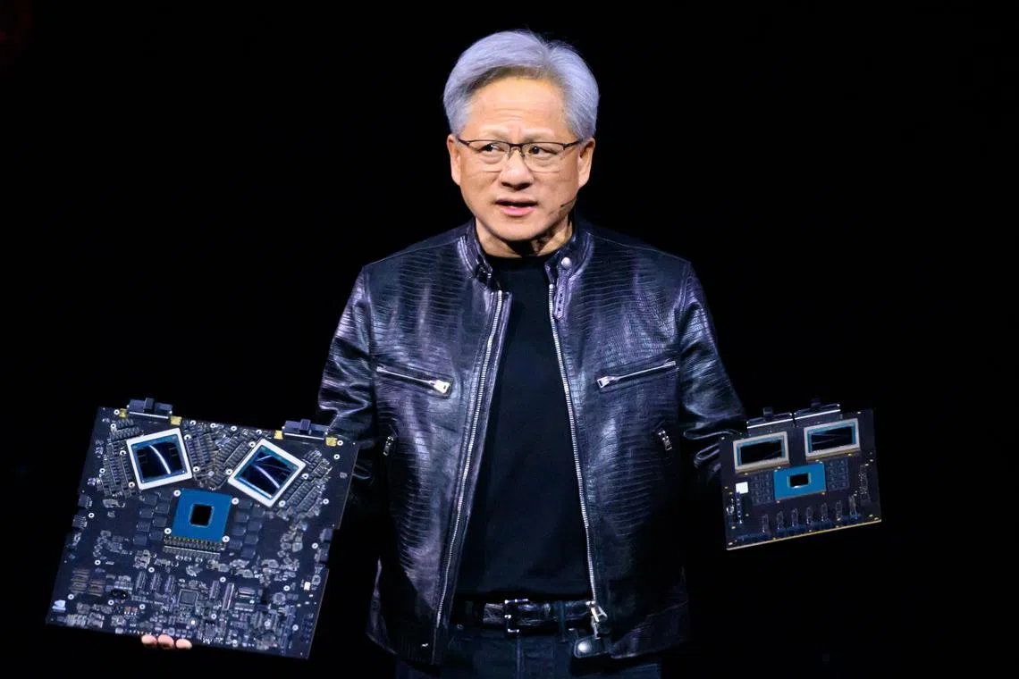 Nvidia chief executive Jensen Huang presenting products at the firm's annual GTC Artificial Intelligence Conference in San Jose, California, on March 18.