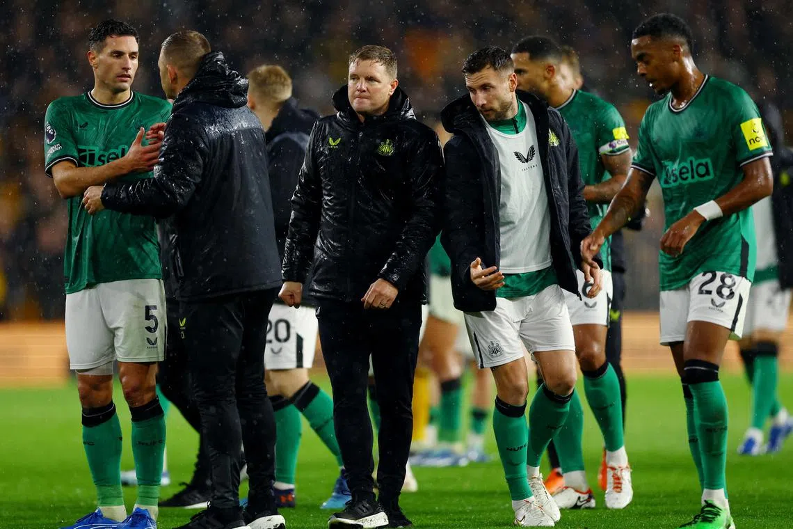 Newcastle United manager Eddie Howe with his players Fabian Schar, Joe Willock and Paul Dummett after the 2-2 Premier League draw against Wolverhampton Wanderers.
