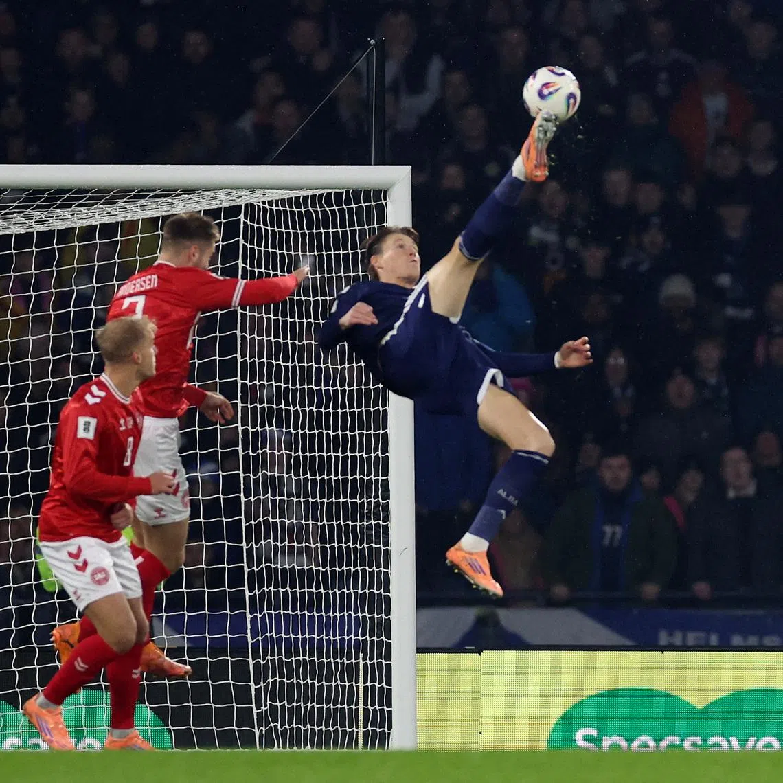 Soccer Football - FIFA World Cup - UEFA Qualifiers - Group C - Scotland v Denmark - Hampden Park, Glasgow, Scotland, Britain - November 18, 2025 Scotland's Scott McTominay scores their first goal REUTERS/Russell Cheyne