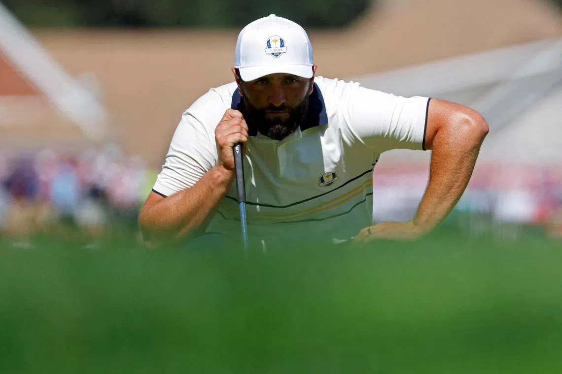 FILE PHOTO: Golf - The 2025 Ryder Cup - Bethpage Black Golf Course, Farmingdale, New York, United States - September 28, 2025 Team Europe's Jon Rahm eyes up his putt on the 3rd hole during the singles IMAGN IMAGES via Reuters/Peter Casey/File Photo