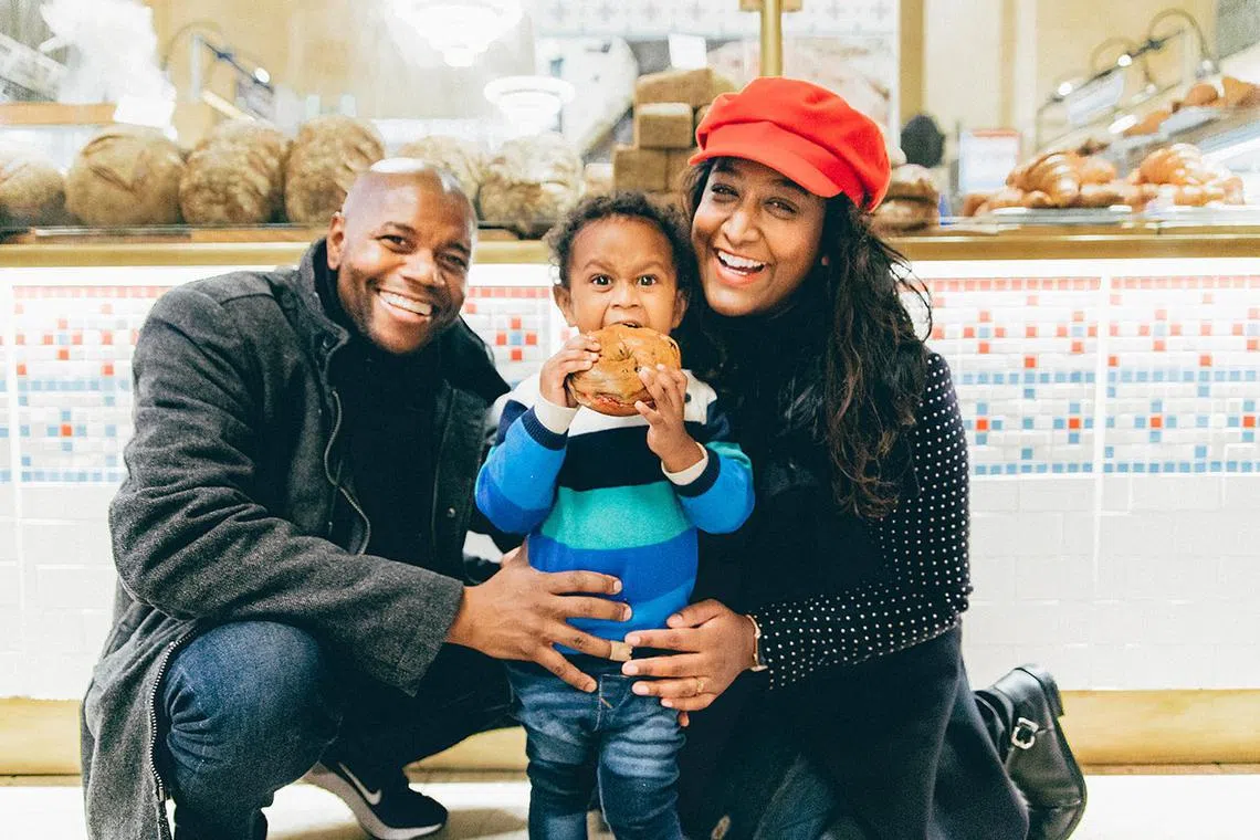Writer Faz Gaffa with her husband and son at New York City's Grand Central Terminal.