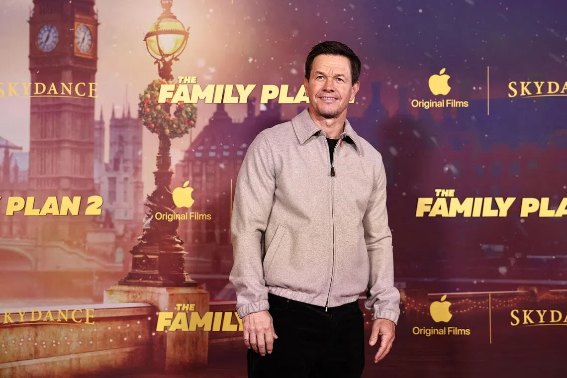 US actor Mark Wahlberg poses on the red carpet on arrival to attend the world premiere for the film "The Family Plan 2" in London on November 11, 2025. (Photo by HENRY NICHOLLS / AFP)