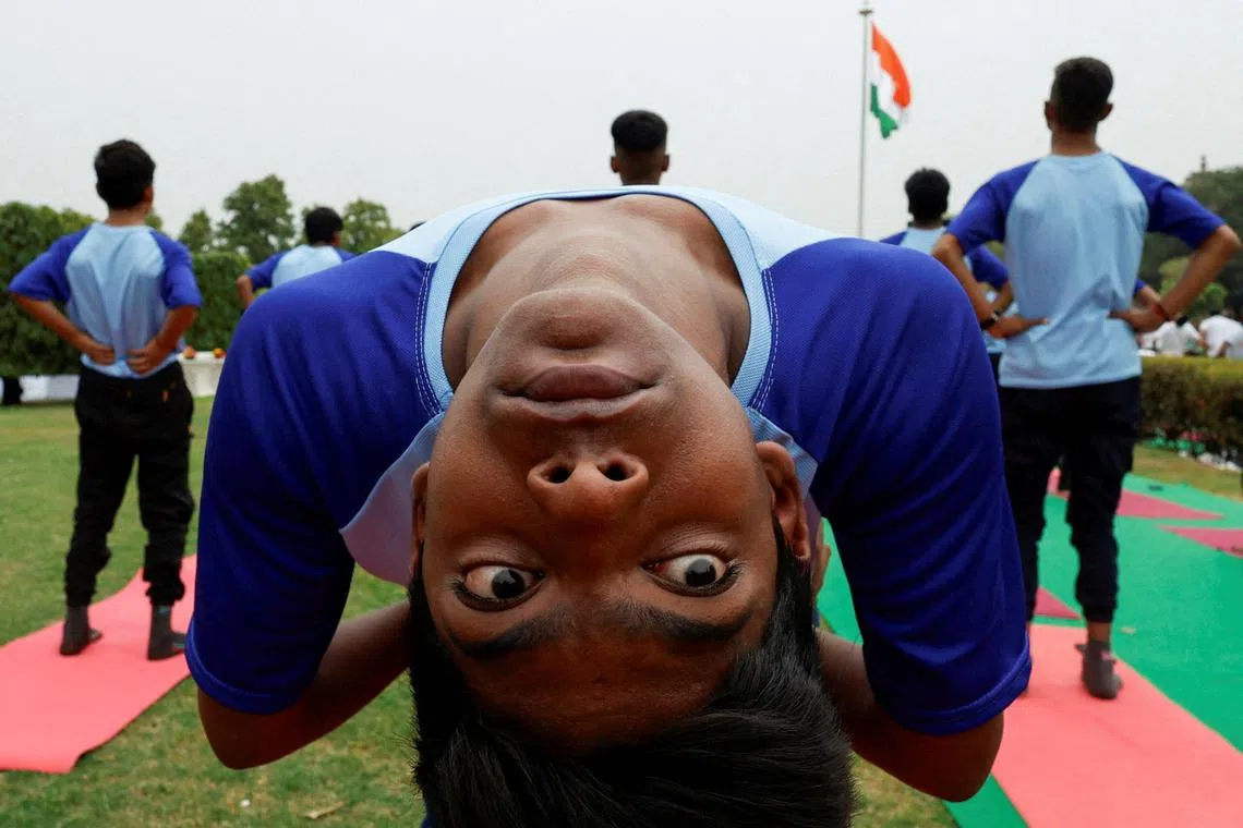 A participant performing yoga during International Yoga Day at Purana Qila, or Old Fort in New Delhi, India, June 21, 2024.