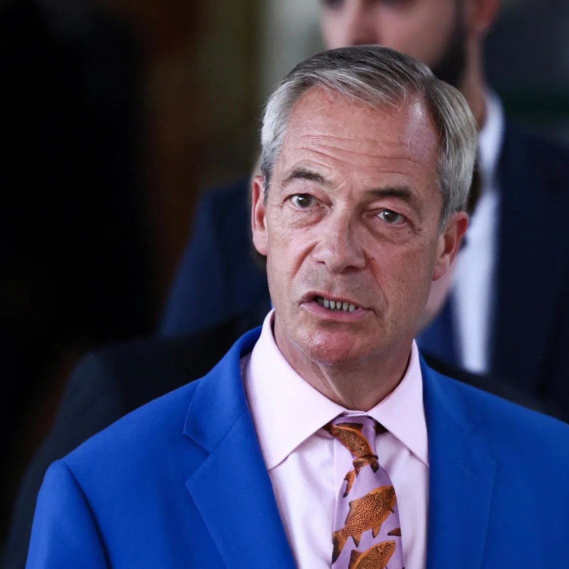Britain's Reform UK party leader Nigel Farage leaves the party headquarters in Millbank after announcing he has resigned as an MP triggering a by-election in his parliamentary seat where he intends to stand for re-election, in London, Britain, July 7, 2026. REUTERS/Jack Taylor