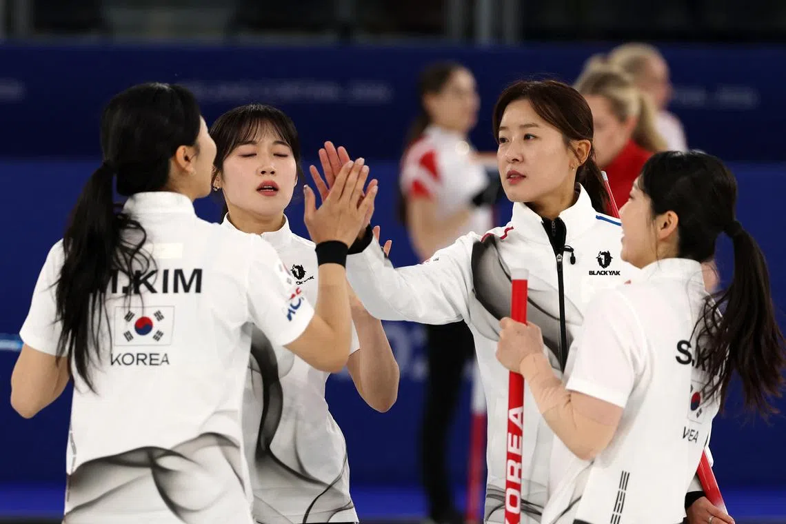 Curling-South Korea ease past Sweden to keep playoff hopes alive