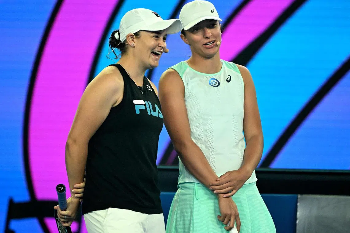 Retired former world No. 1 Australian tennis player Ashleigh Barty (left) and Poland's Iga Swiatek attend the 'Kids Tennis Day' event ahead of the Australian Open.