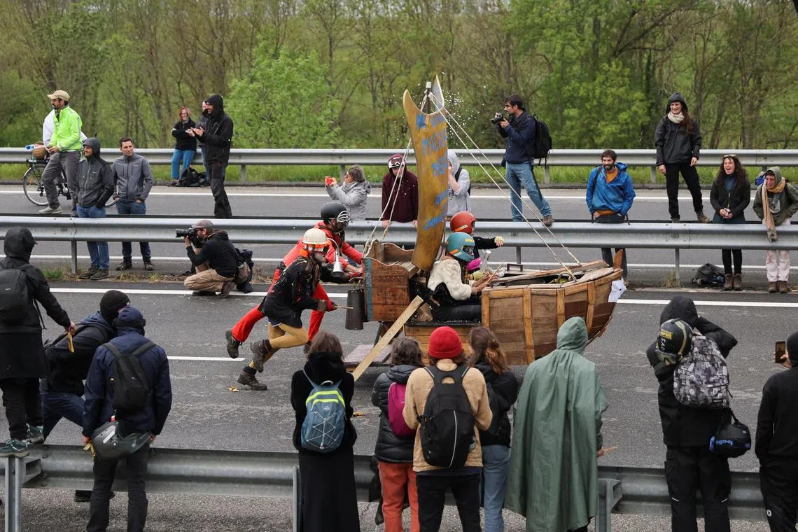 Activists gather in France to protest against a highway project that would link the southern cities of Toulouse and Castres.