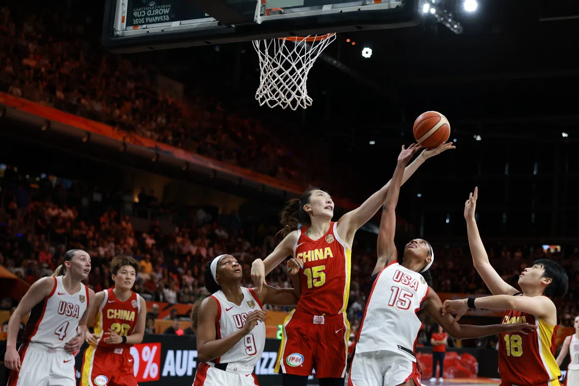 Angel Reese of the US (centre-right) in action against China’s Han Xu (centre-left) during the 2026 FIBA Women’s Basketball World Cup match at the Max-Schmeling-Halle venue in Berlin, Germany.