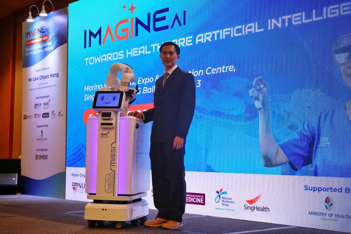 ST20241205_202458600341/ocrobot05/Osmond/Jason Quah

Adjunct professor Ngiam Kee Yuan, head, division of biomedical informatics, NUS Yong Loo Lin School of Medicine,  poses with the Missi robot at the healthtech conference Imagine AI 2024 at Marina Bay Sands on Dec 5, 2024. Patients at NUHS’ hospitals will be attended to by robot nurses who can give them basic medical advice, check on their condition and dispense medication to ease the workload on nurses. ST PHOTO: JASON QUAH