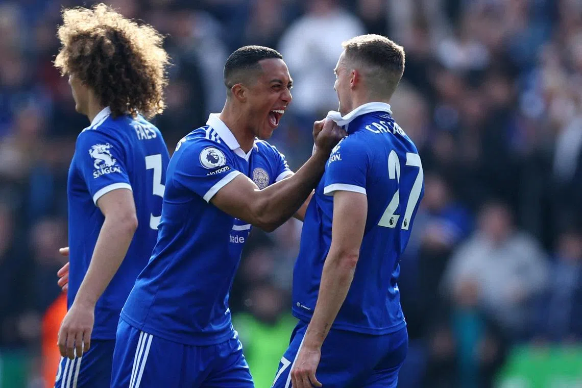 Leicester City's Youri Tielemans and Timothy Castagne celebrate after the match.