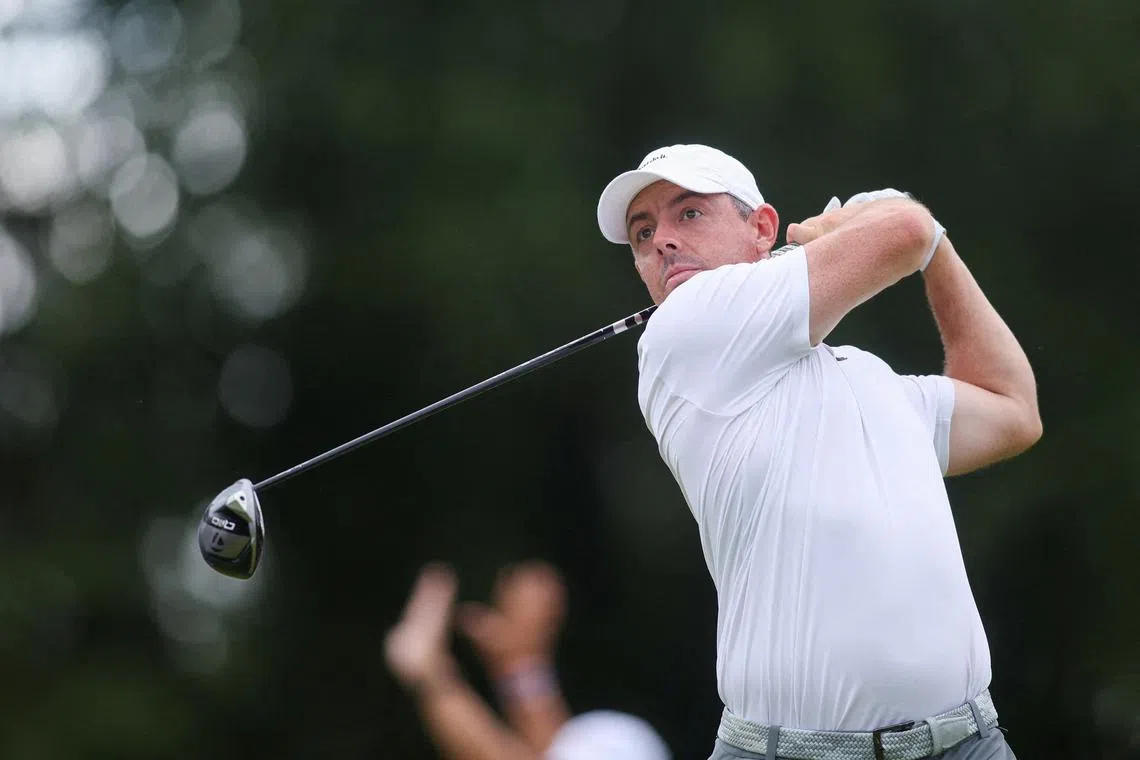 FILE PHOTO: Aug 23, 2025; Atlanta, Georgia, USA; Rory McIlroy plays his shot from the 18th tee during the third round of the TOUR Championship golf tournament. Mandatory Credit: Brett Davis-Imagn Images/File Photo