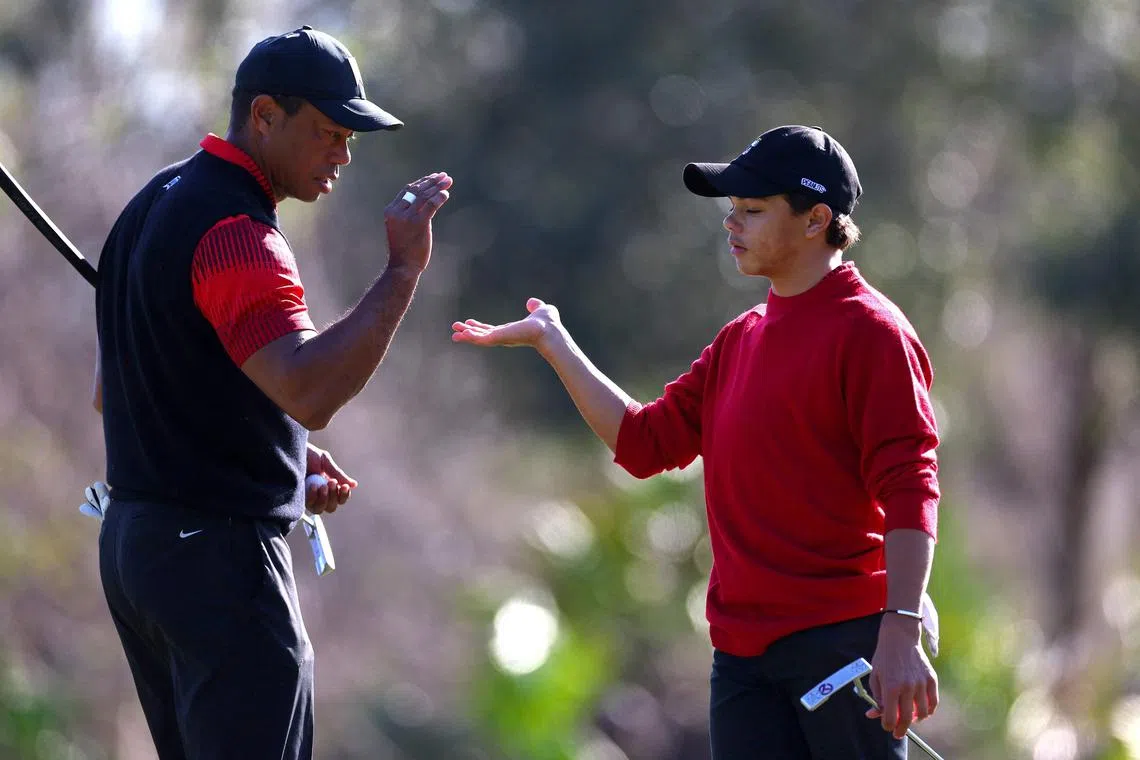 A 2022 photo shows US golfer Tiger Woods and his son, Charlie, during the final round of the PNC Championship.