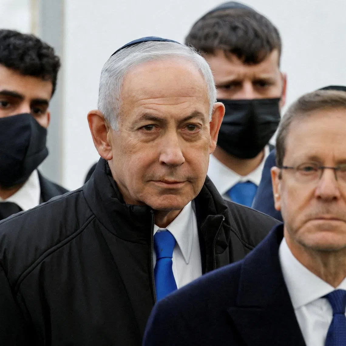 FILE PHOTO: Israeli Prime Minister Benjamin Netanyahu and Israeli President Isaac Herzog attend a memorial service in Meitar, Israel, January 28, 2026. REUTERS/Amir Cohen/File Photo