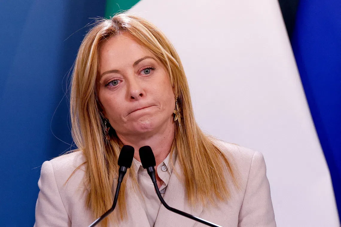 FILE PHOTO: Italian Prime Minister Giorgia Meloni attends a joint statement with German Chancellor Friedrich Merz (not pictured) at the end of Italian-German government consultations at Villa Doria Pamphili in Rome, Italy, January 23, 2026. REUTERS/Remo Casilli/File Photo