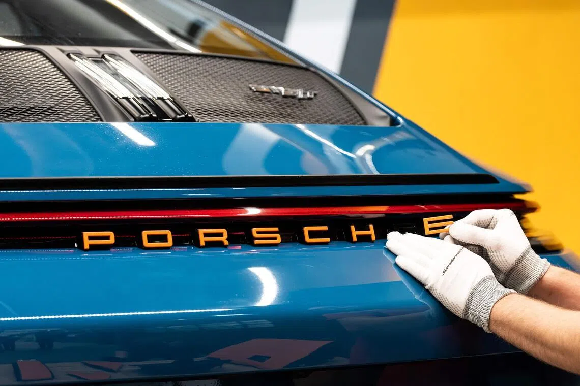 The agreement underscores the mounting pressure across Porsche parent Volkswagen.
